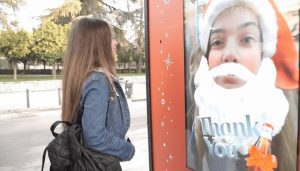 politis coca cola outdoor advertising ooh wrap shelter dooh digital