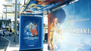 politis smurfs outdoor advertising ooh wrap shelter
