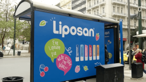 politis liposan outdoor advertising ooh wrap shelter